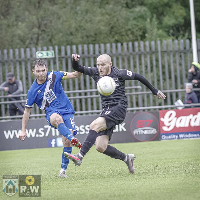 Bluebirds skipper Dan Rees puts in a cross